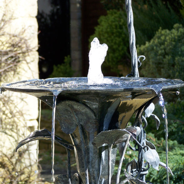 Fountain in patinated, galvanised steel