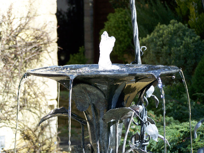 Fountain in patinated, galvanised steel
